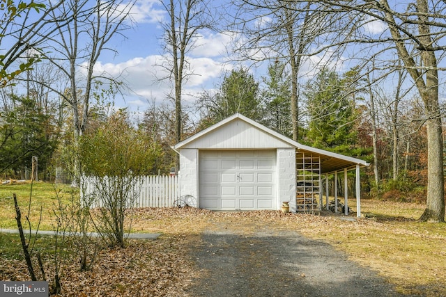 garage featuring a carport