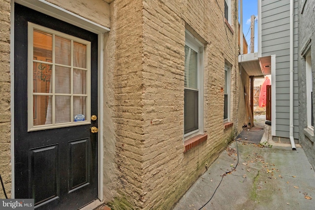 view of side of home with a patio