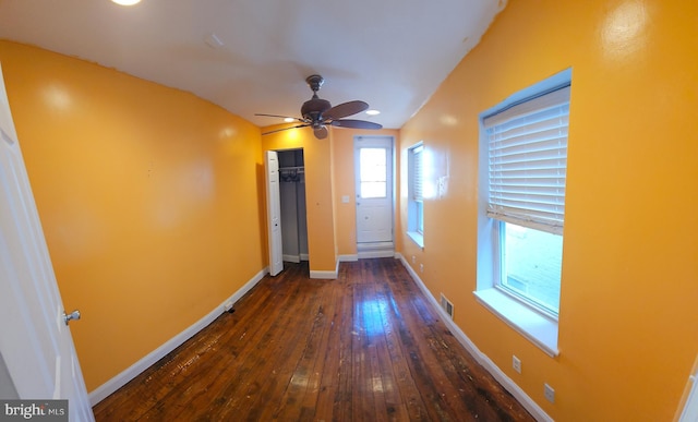 hallway featuring dark wood-type flooring