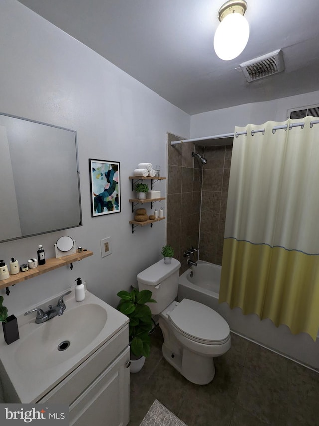 full bathroom featuring toilet, shower / tub combo with curtain, vanity, and tile patterned floors