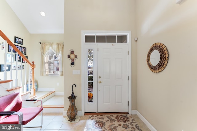 entrance foyer featuring light tile patterned floors