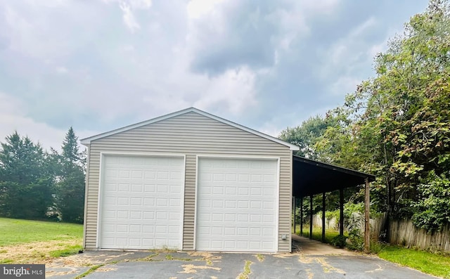 garage with a carport