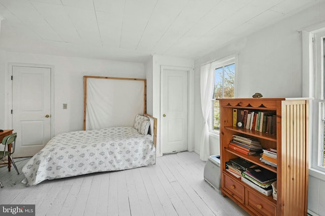 bedroom with light wood-type flooring