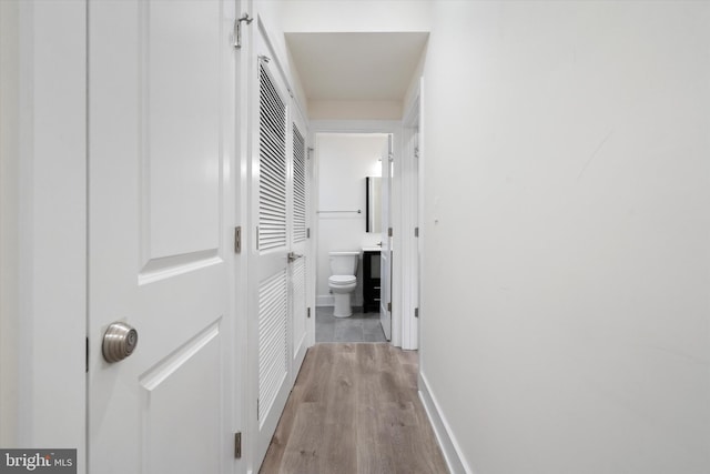 hallway featuring light hardwood / wood-style floors