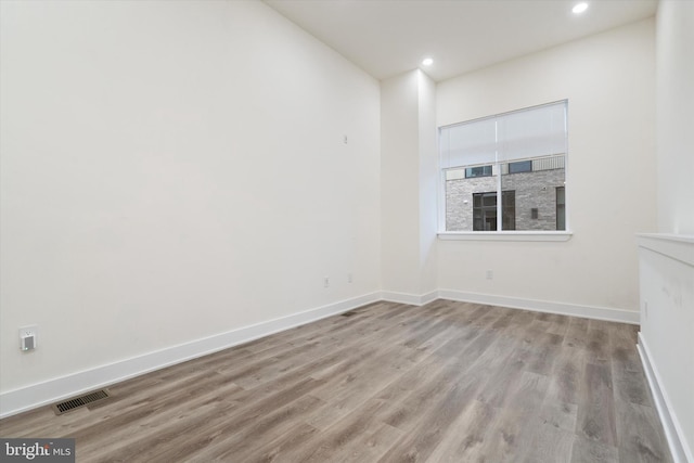 unfurnished room featuring light wood-type flooring