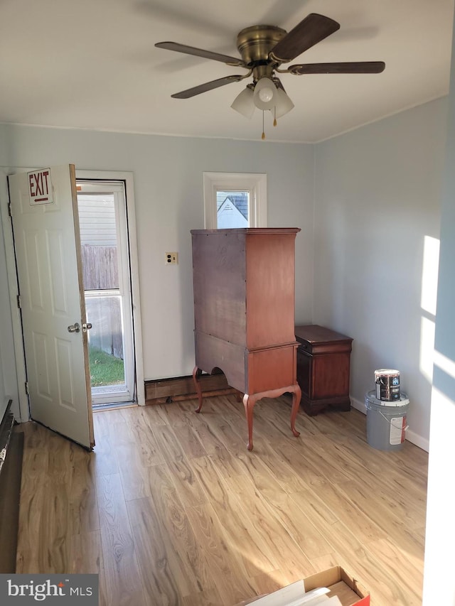 unfurnished room featuring ceiling fan and light hardwood / wood-style flooring