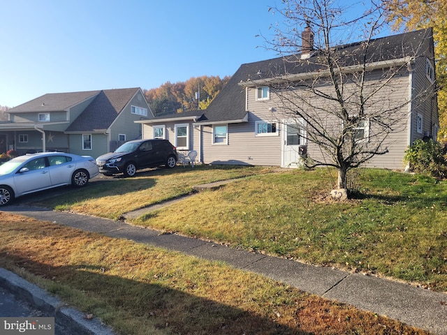 view of front of house featuring a front yard