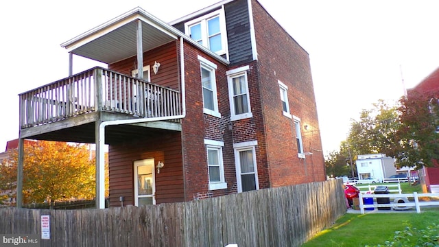 view of home's exterior featuring a lawn