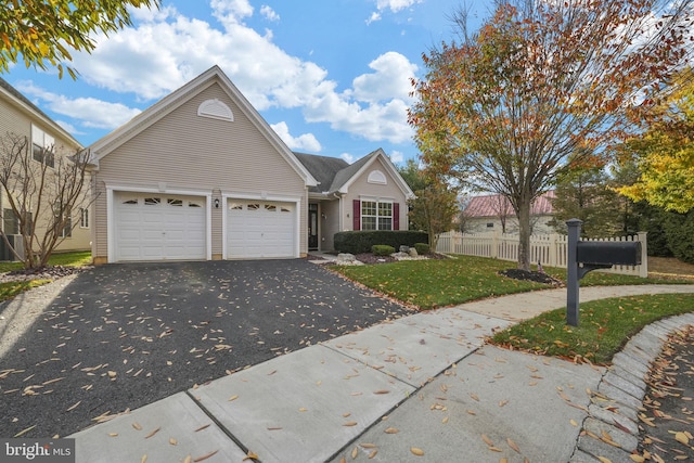 front of property with a garage