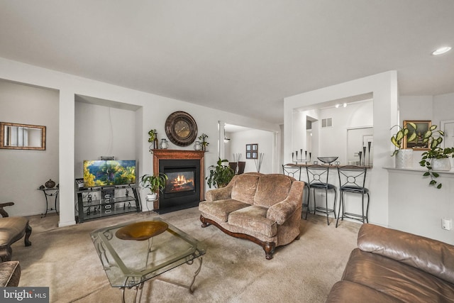 living room with light colored carpet