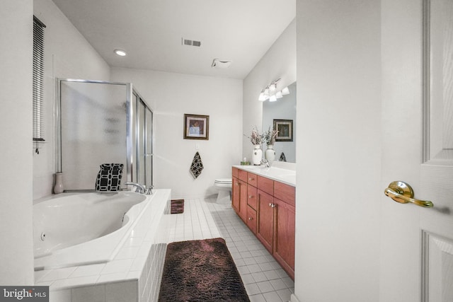 full bathroom featuring tile patterned floors, vanity, toilet, and separate shower and tub