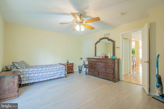 417 E Red Lion Dr, Bear, DE 19701 - bedroom with light wood-type flooring, a ceiling fan, and baseboards