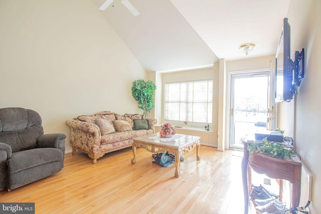 417 E Red Lion Dr, Bear, DE 19701 - living area featuring light wood-style floors and vaulted ceiling