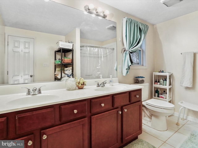 bathroom featuring a shower with curtain, tile patterned flooring, a textured ceiling, toilet, and vanity