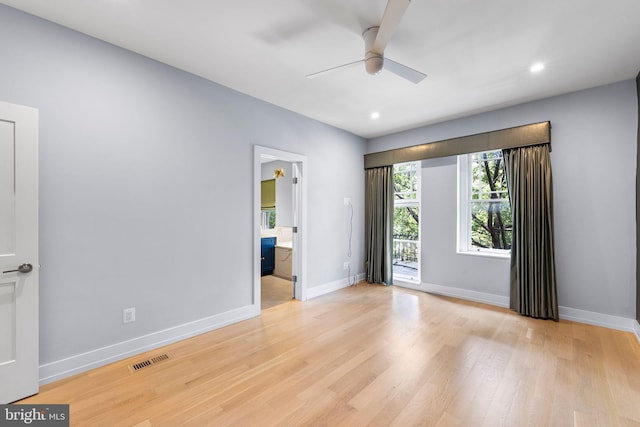 unfurnished room with light hardwood / wood-style flooring and ceiling fan