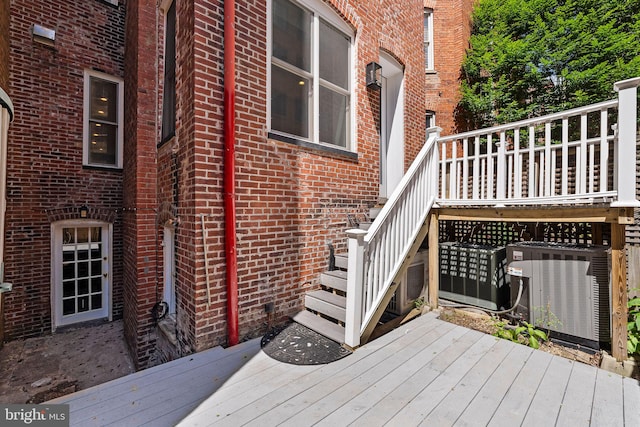 wooden terrace with central AC unit