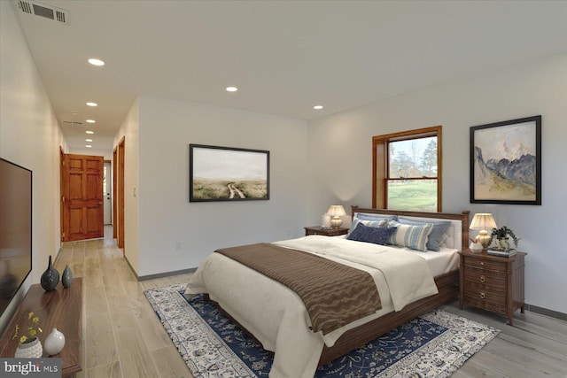 bedroom featuring light hardwood / wood-style floors