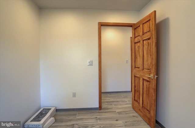 hallway featuring light hardwood / wood-style flooring