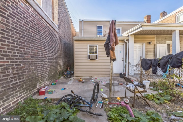 rear view of property with a patio