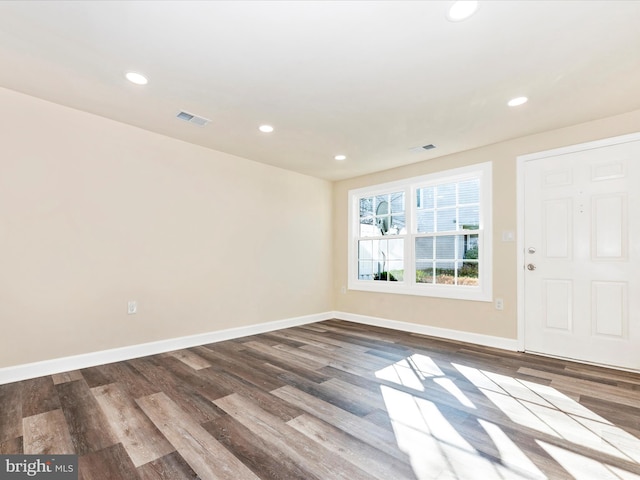 foyer entrance with dark hardwood / wood-style flooring