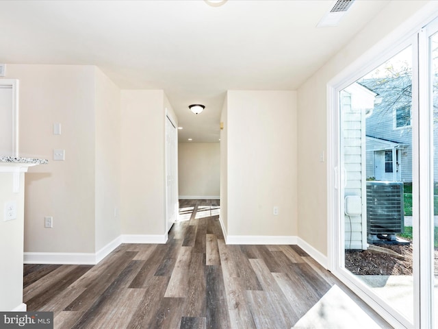 hall featuring dark hardwood / wood-style floors