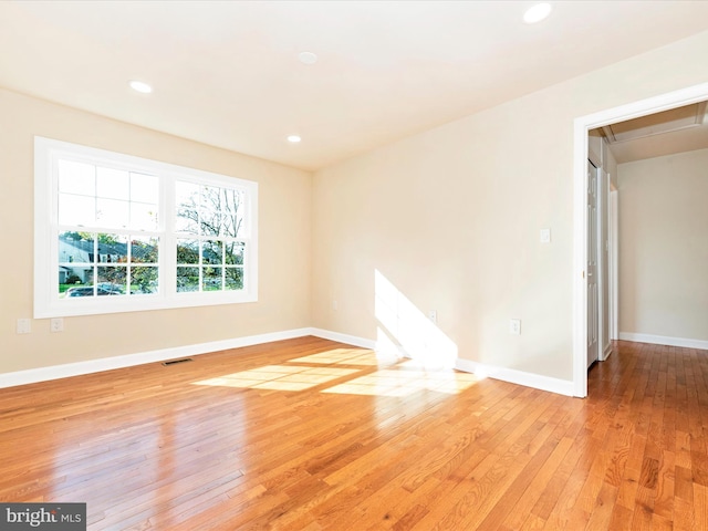 unfurnished room featuring light wood-type flooring