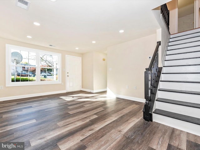 interior space with dark hardwood / wood-style flooring