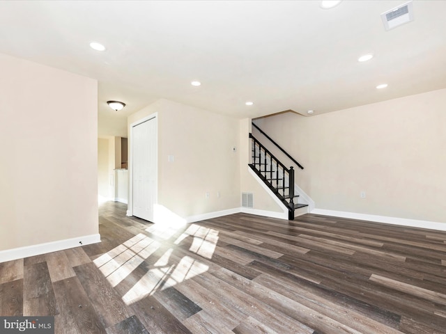 empty room featuring dark hardwood / wood-style floors