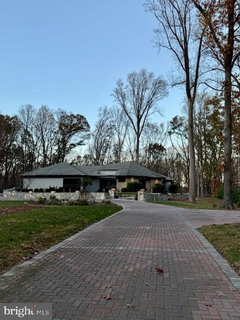 view of front of home with a front yard