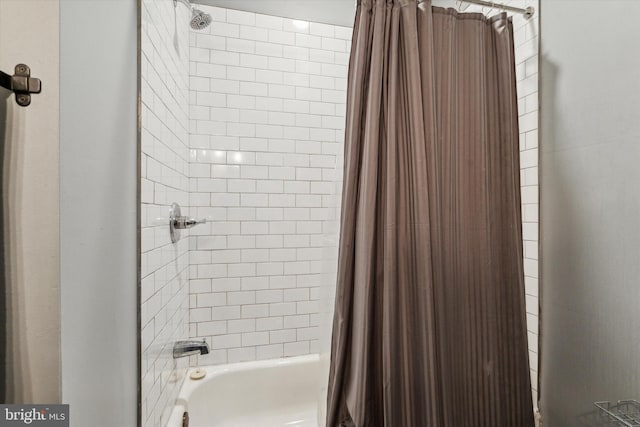 bathroom featuring shower / bath combo