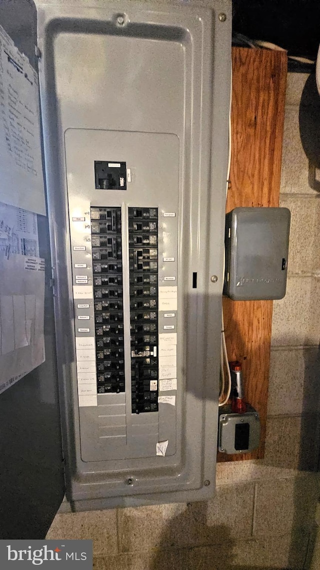 utility room featuring electric panel