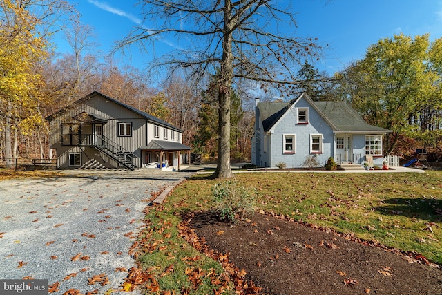 view of side of home featuring a yard