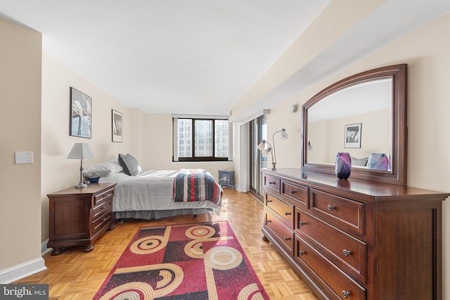 bedroom featuring light parquet floors