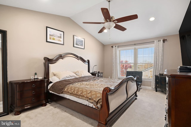 carpeted bedroom featuring ceiling fan and vaulted ceiling