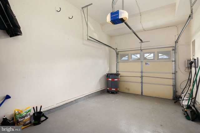 garage featuring a garage door opener