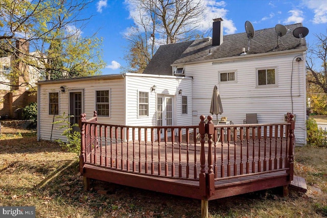 rear view of property with a deck