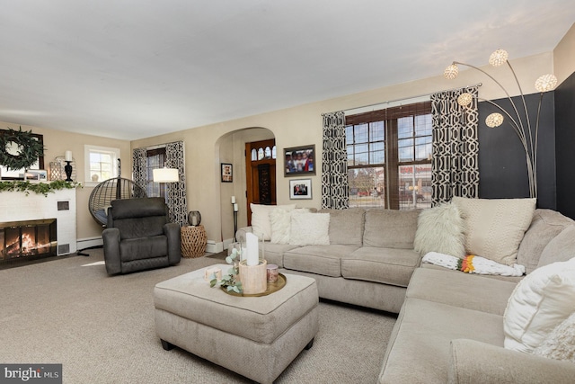 carpeted living room featuring a wealth of natural light