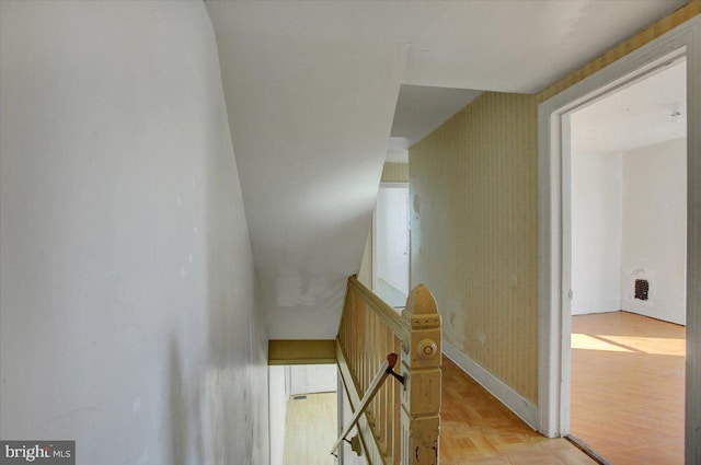 staircase with parquet floors