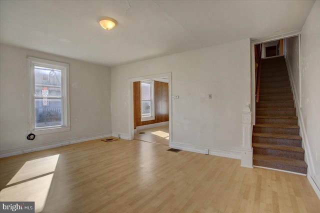 unfurnished room featuring light wood-type flooring