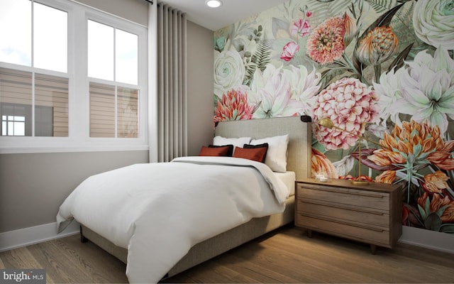 bedroom featuring hardwood / wood-style flooring