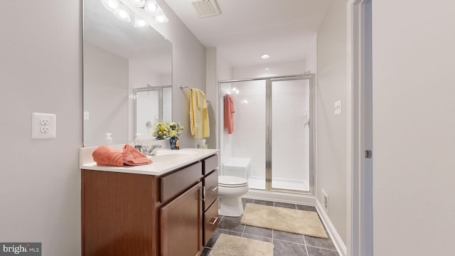 bathroom featuring tile patterned flooring, an enclosed shower, vanity, and toilet