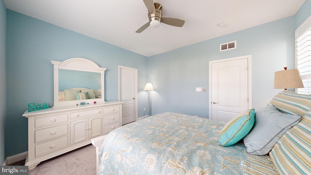 carpeted bedroom featuring ceiling fan