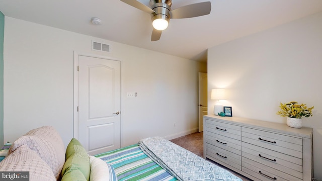 carpeted bedroom featuring ceiling fan