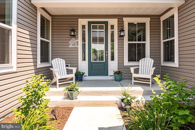 property entrance with covered porch