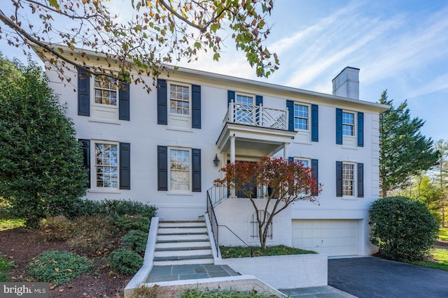 colonial home featuring a garage