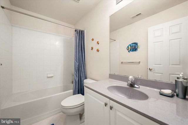 full bathroom featuring shower / tub combo with curtain, vanity, toilet, and tile patterned floors