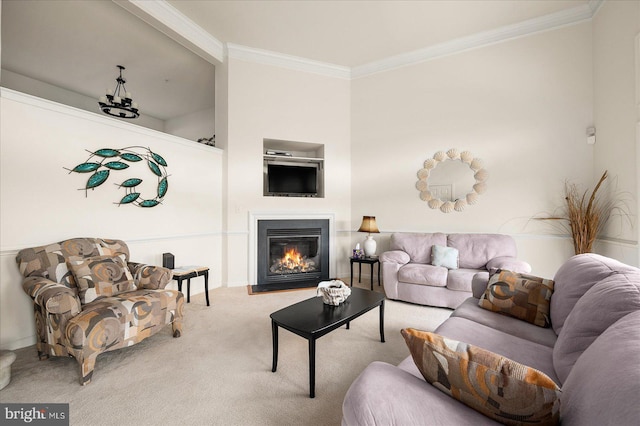 carpeted living room featuring ornamental molding