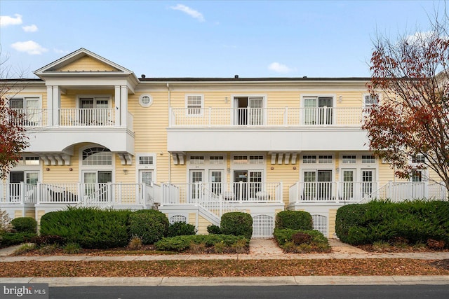 multi unit property featuring a balcony