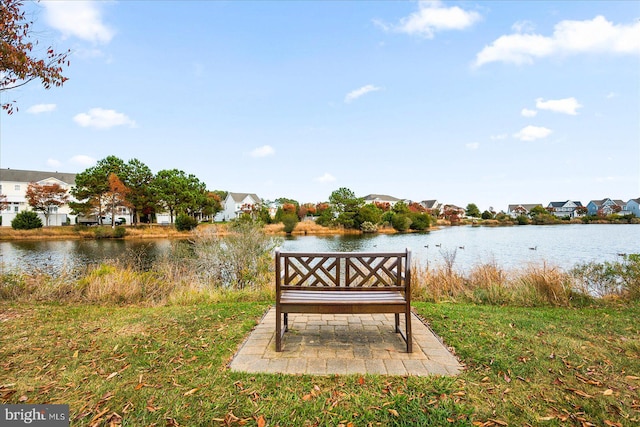 view of home's community with a water view