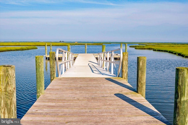 dock area featuring a water view